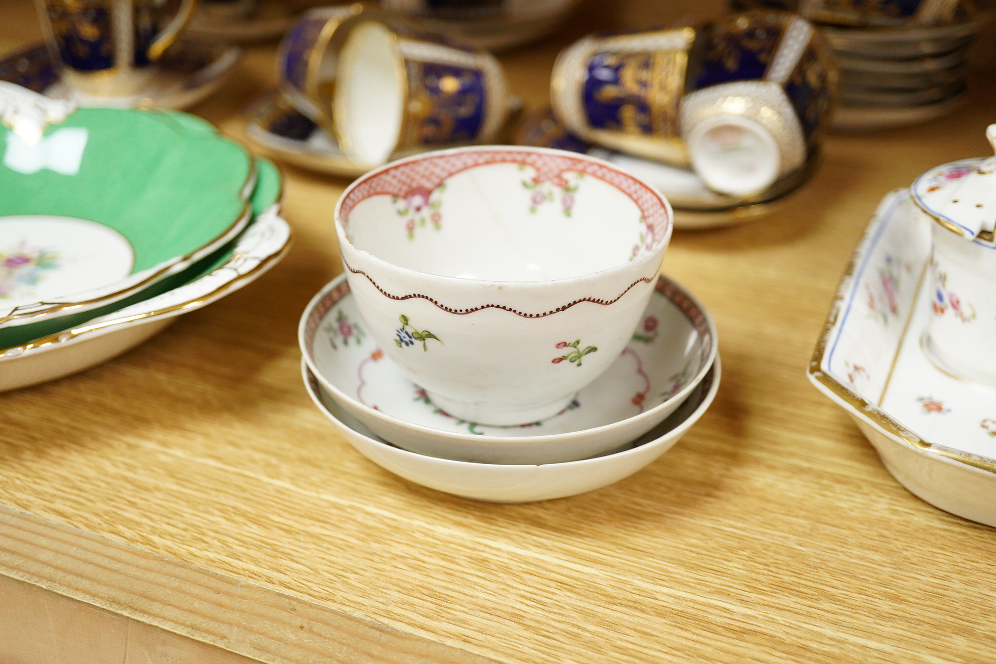 A collection of Coalport porcelain to include cups and saucers, a Meissen Pony, Meissen blue and white plate and a 19th century desk stand, largest 25cm wide